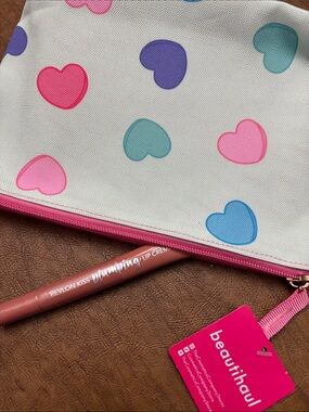 Revlon Kiss Plumping Lip Creme and Heart Print Cosmetic Bag.